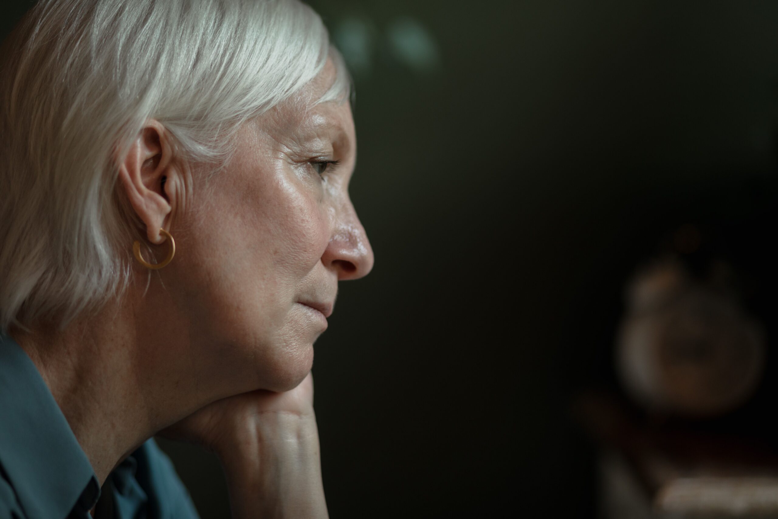 elder woman staring blankly
